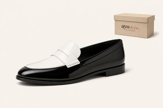 The Noir Ivory Penny Loafer